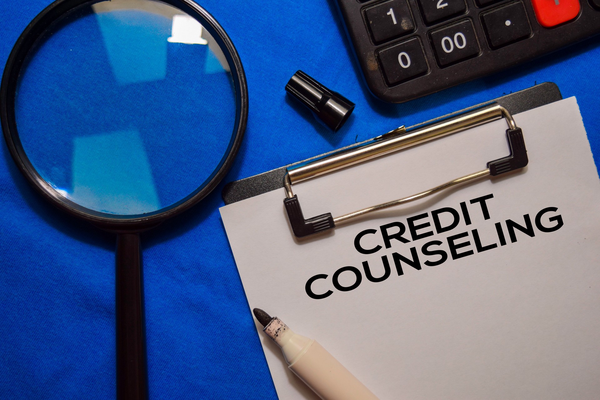 Credit Counseling text on Document form isolated on office desk.